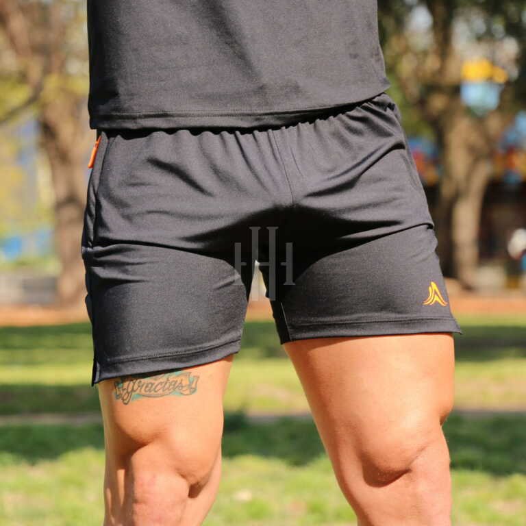 Short negro, logo naranja, con cierre, Crossray