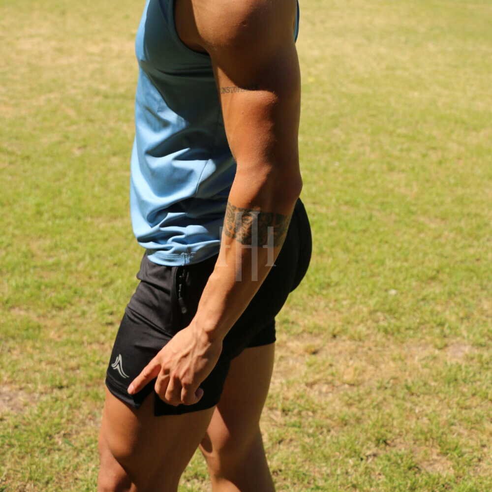 Musculosa elastizada urban gym sport Crossray Aero / Short negro, logo blanco, con cierre. Crossray